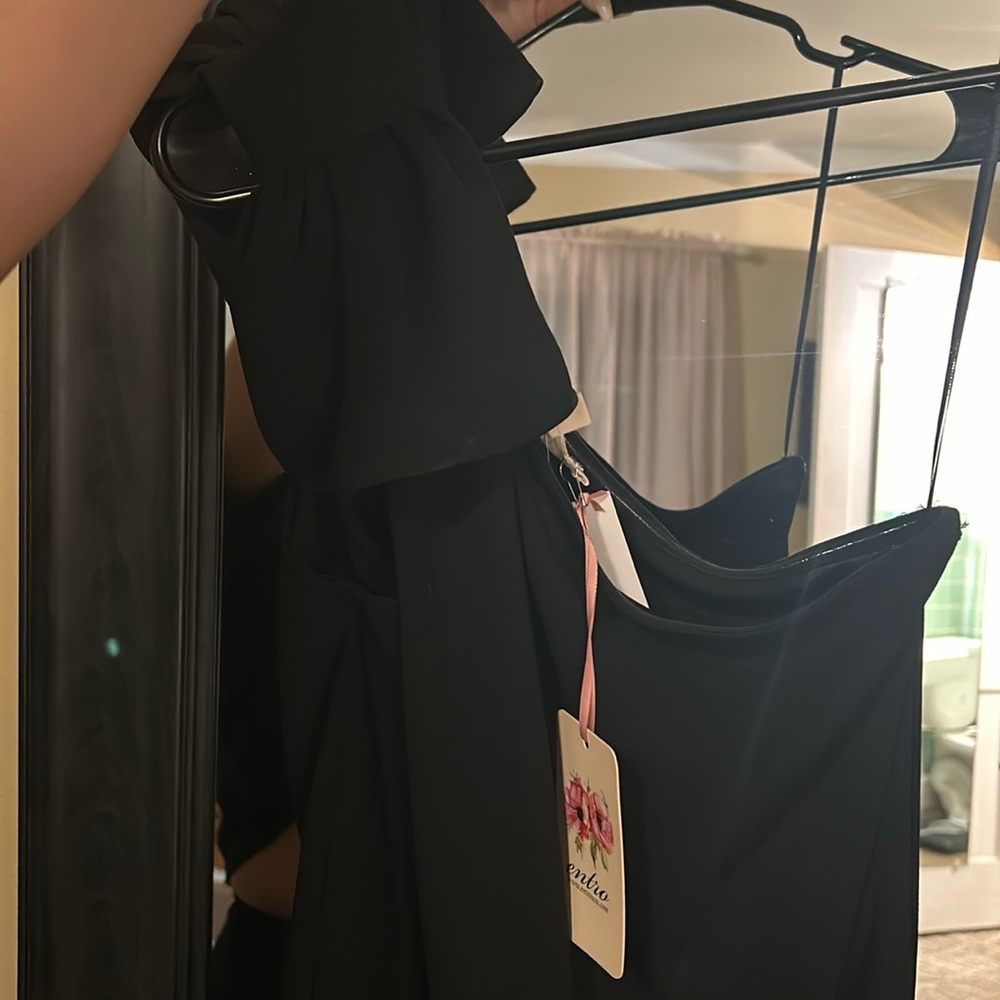 Entro black one piece jumpsuit.